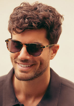 ALVIN | Oak Handcrafted, luxury dark brown and tan tortoise acetate large round wayfarer KREWE sunglasses mens model campaign | Model: Douglas